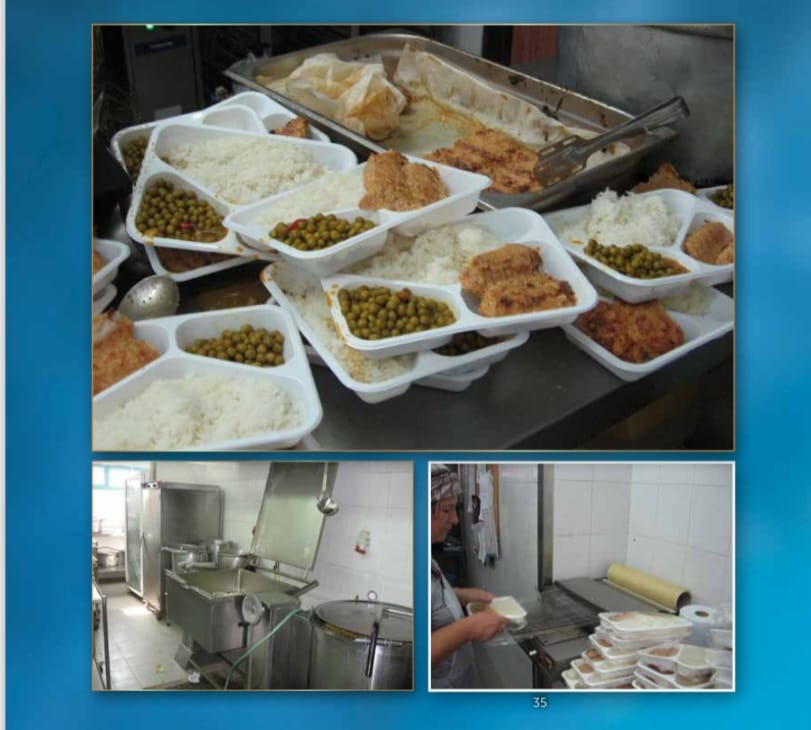 Hot meals being prepared and packed for holiday distribution